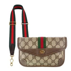 Gucci pouch with added strap